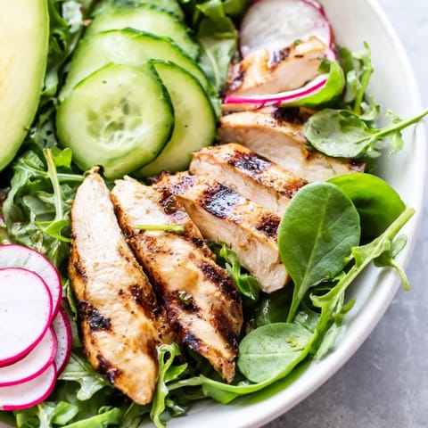 Bright spring greens are tossed with tender, juicy chicken, cool cucumber, and peppery radish, drizzled with a sunny, zesty lemon dressing for a refreshing bite.